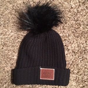 Love Your Melon black cuffed pom beanie